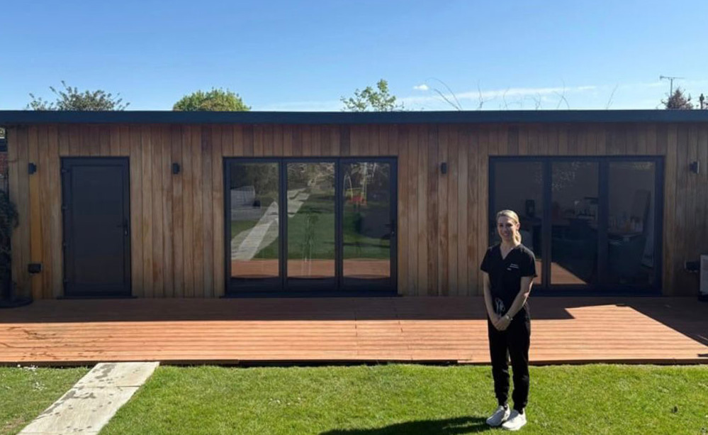 drclare standing outside grange park clinic